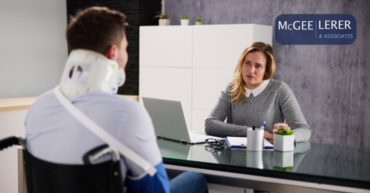 injured man talking to lawyer