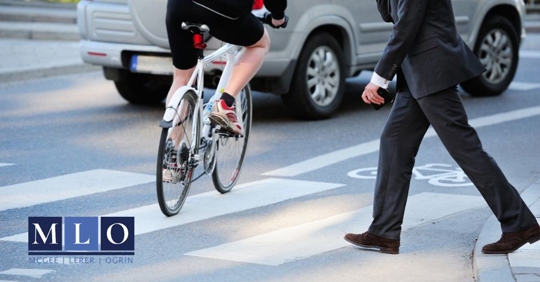 man walking in the pedestrian lane