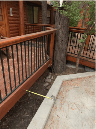 image of gap between carport and trench in daylight