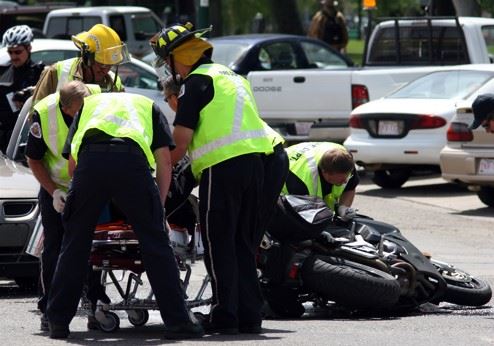 emergency crews responding to motorcycle crash